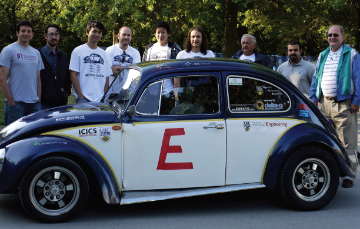 University of British Columbia Electric Car Club president Ricky Gu (third from left) and fellow club memebers pose with their EV modified 1972 VW Beetle, which traveled 14 days and 6400 km across Canada.
