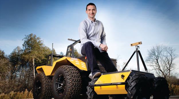 Clearpath Robotics CEO Matt Rendall with the Waterloo-based company's all-terrain Grizzly  RUV.